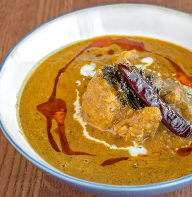 Chicken Tikka Masala in creamy spiced tomato gravy at Rawaayt Indian restaurant in Ellerslie, Edmonton